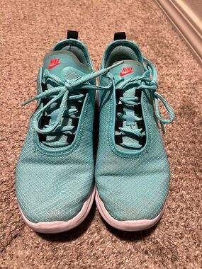 Nike Women's Teal Athletic Running Shoes with Coral Logo